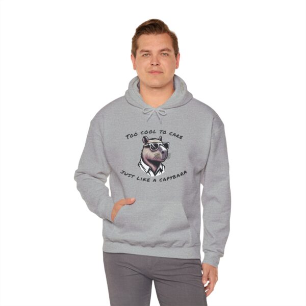 17468992695869368842_2048-1.jpeg Unisex Heavy Blend™ Hooded Sweatshirt with Cute Capybara Design – Warm and Stylish Hoodie