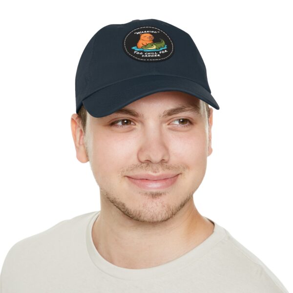 14743302092405632872_2048.jpeg Dad Hat with Leather Patch (Round) - Capybara design