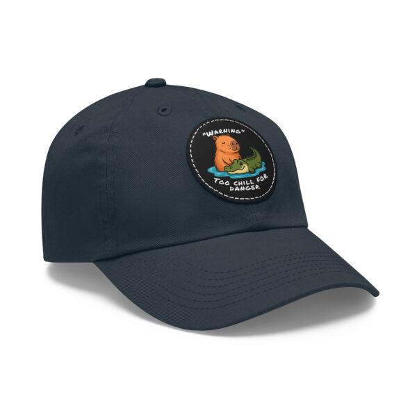 6002391336043693656_2048.jpeg Dad Hat with Leather Patch (Round) - Capybara design